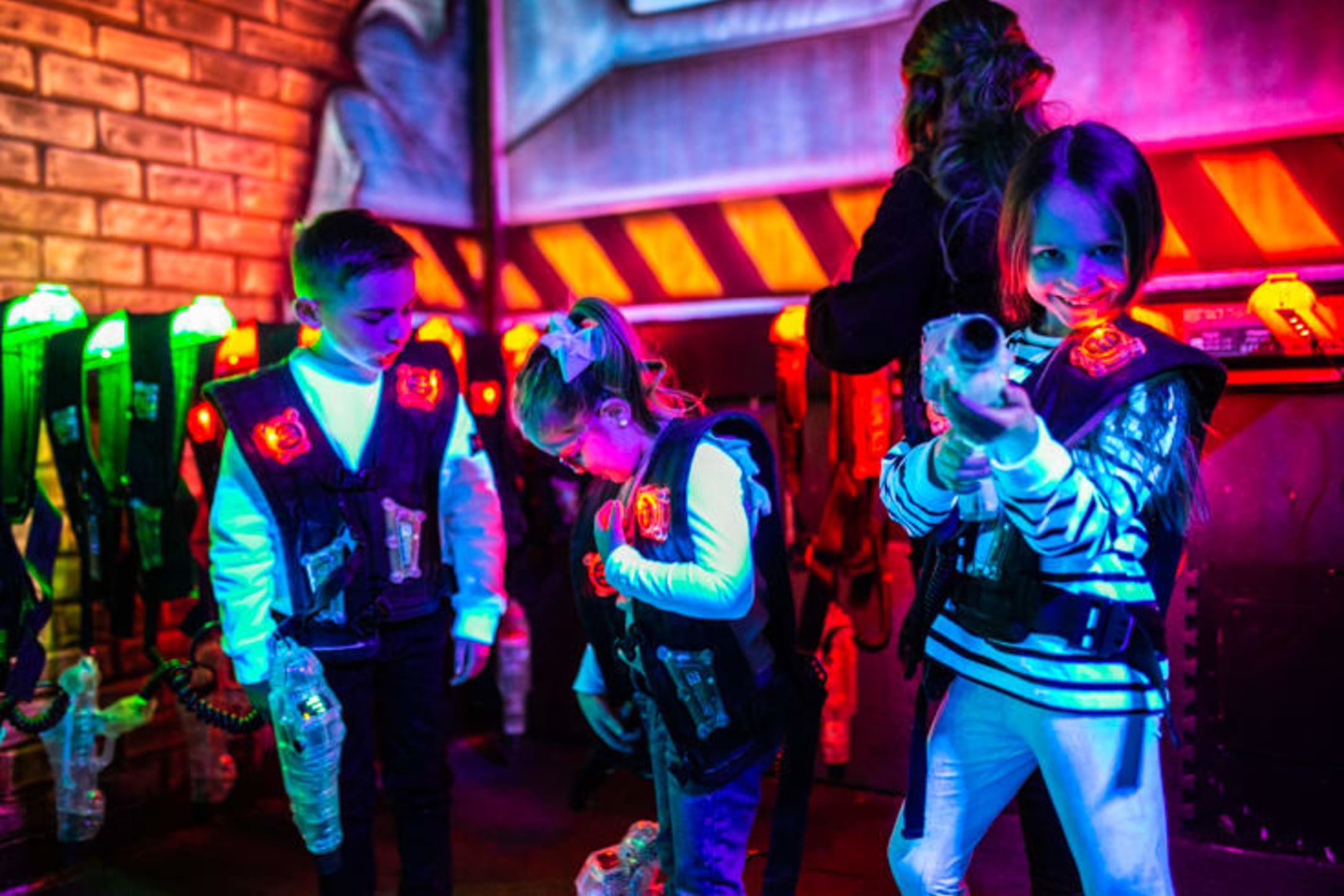 JOIN AN EPIC GLOW-IN-THE-DARK LASER TAG BATTLE